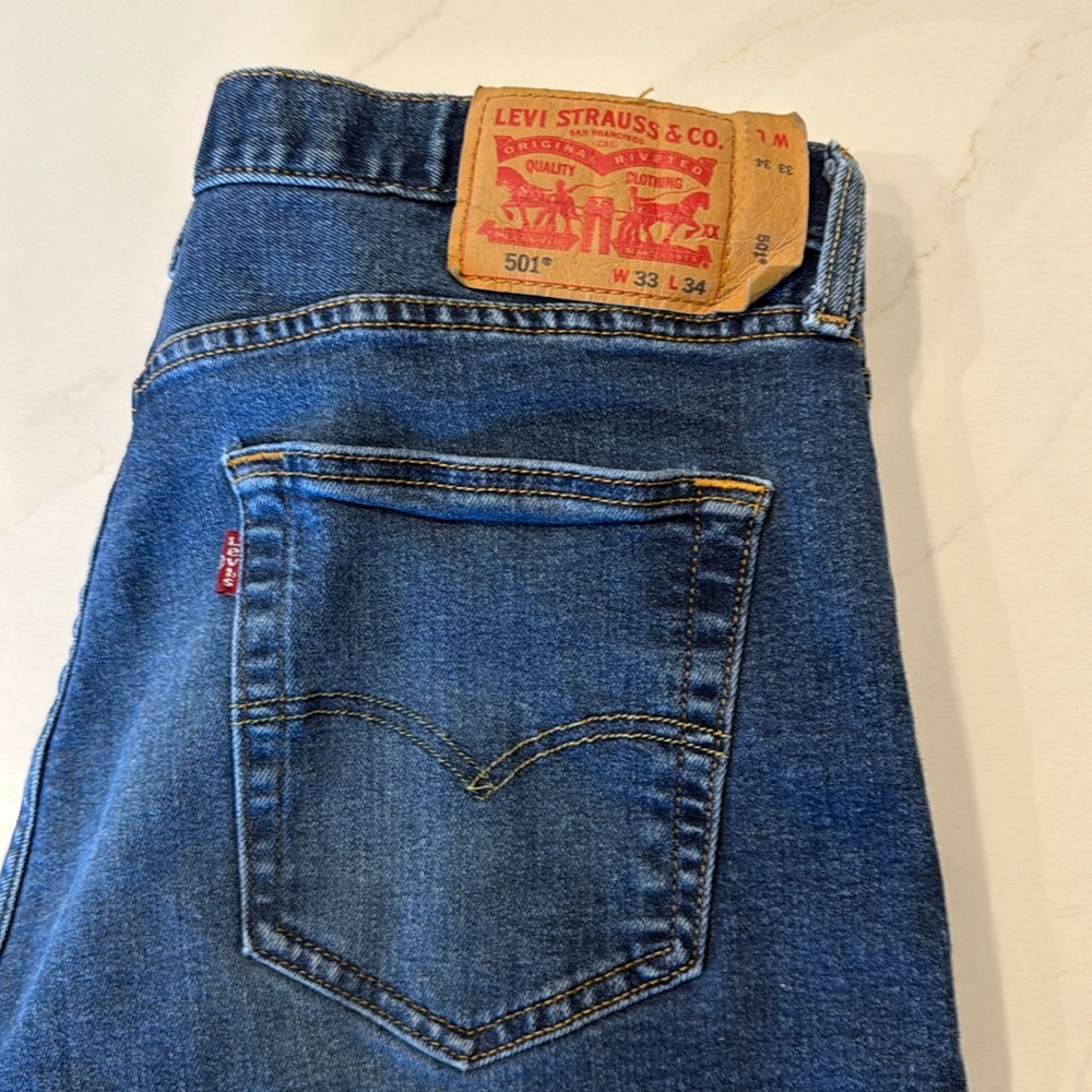 Levi’s 501. 33x34. Medium Blue Fade. Good Condition.